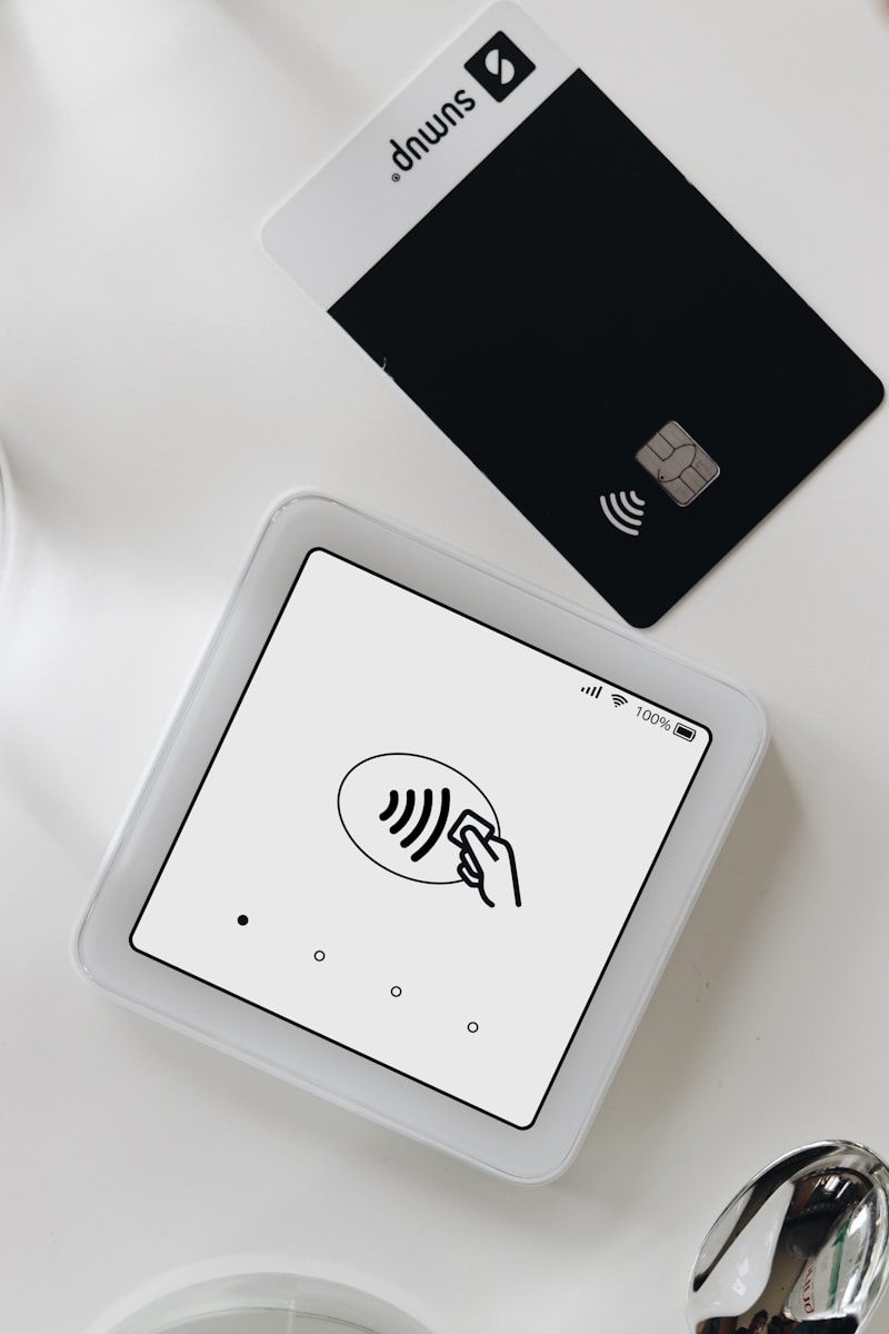 A tablet computer sitting on top of a white table